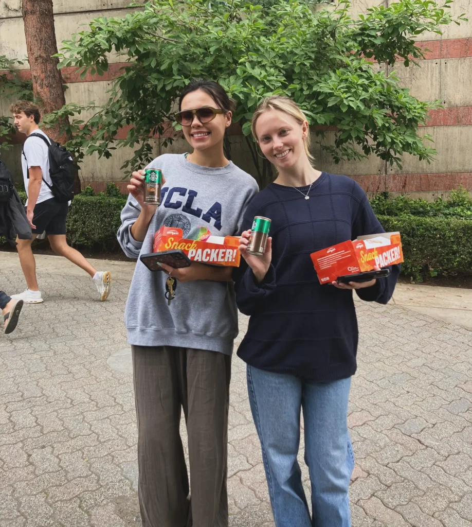 Students grabbing drinks at The Hive Glenrock event - UCLA Housing